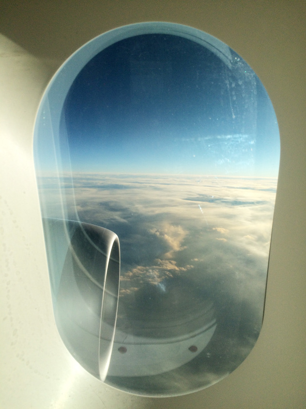 Airplane bathroom window over the Pacific